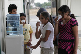 Fifth and sixth grade students in Seville, Calif., took a water break before physical education class. Photo by Jim Wilson/The New York Times.
