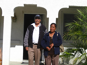 Mr. and Mrs. Gopar in front of their new Riverside County home.