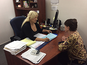 CRLA Community Worker Veronica Tamayo helps Elizabeth Armstrong navigate Medicare enrolment.