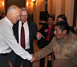 Former Salinas CRLA Directing Attorney, Senator Bill Monning, introduces Governor Jerry Brown to Juan Vasquez.